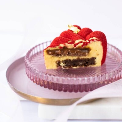 A cut mini cake with visible layers