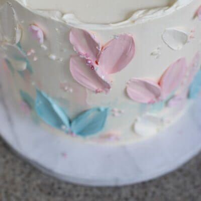 Baby shower cake with pink and blue accents