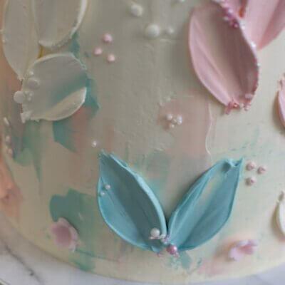 Blue and pink color accents on a cake
